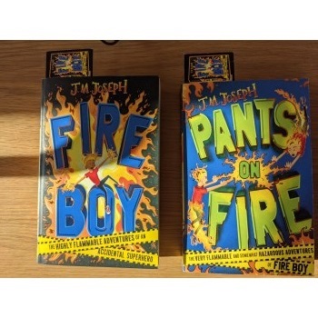 Signed copies of the first two Fire Boy books, by JM Joseph
