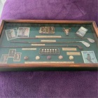Vintage golf memorabilia in a frame