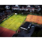Child's group tennis lesson with professional coach at exclusive Teddington Lawn Tennis Club